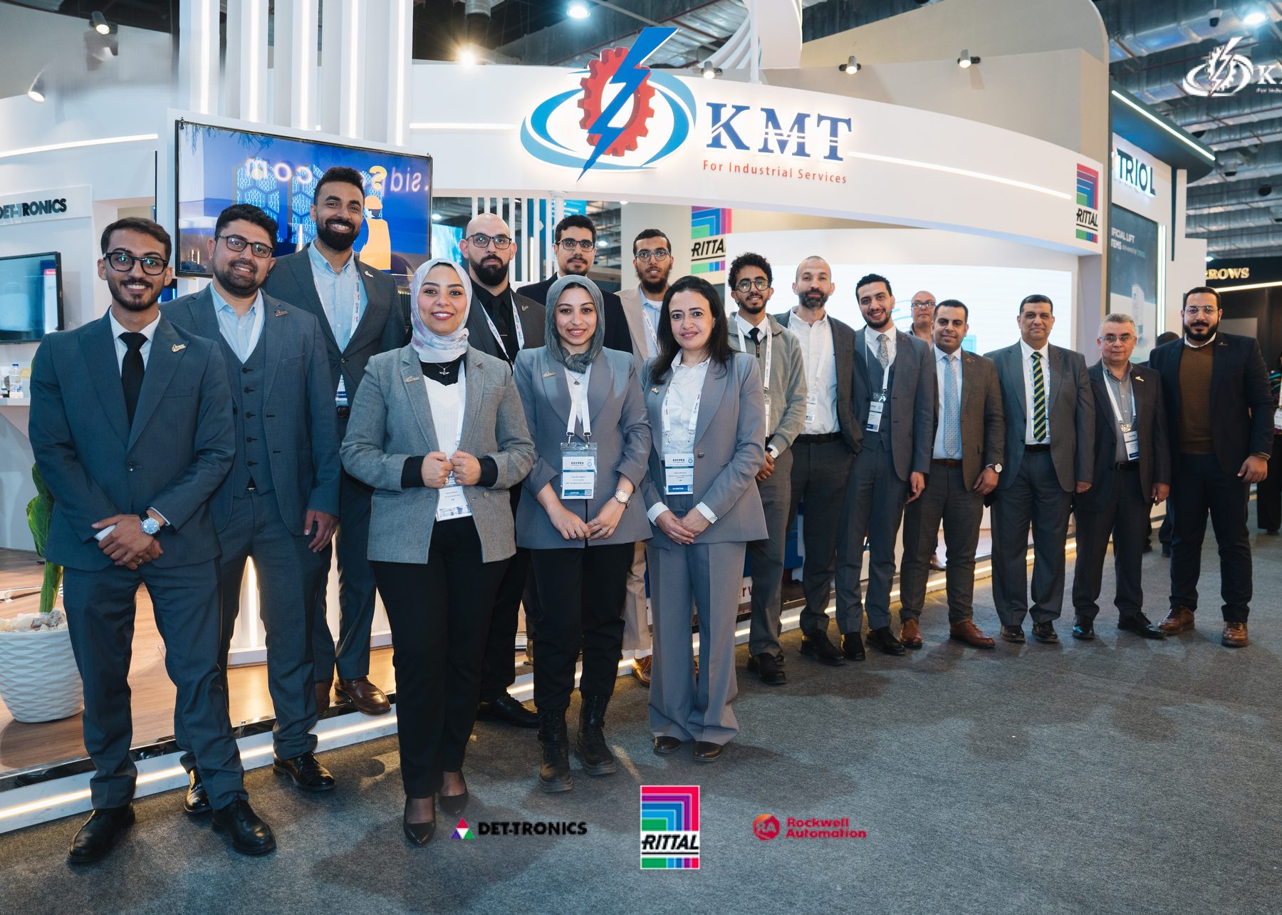 The KMT team at an industry exhibition booth